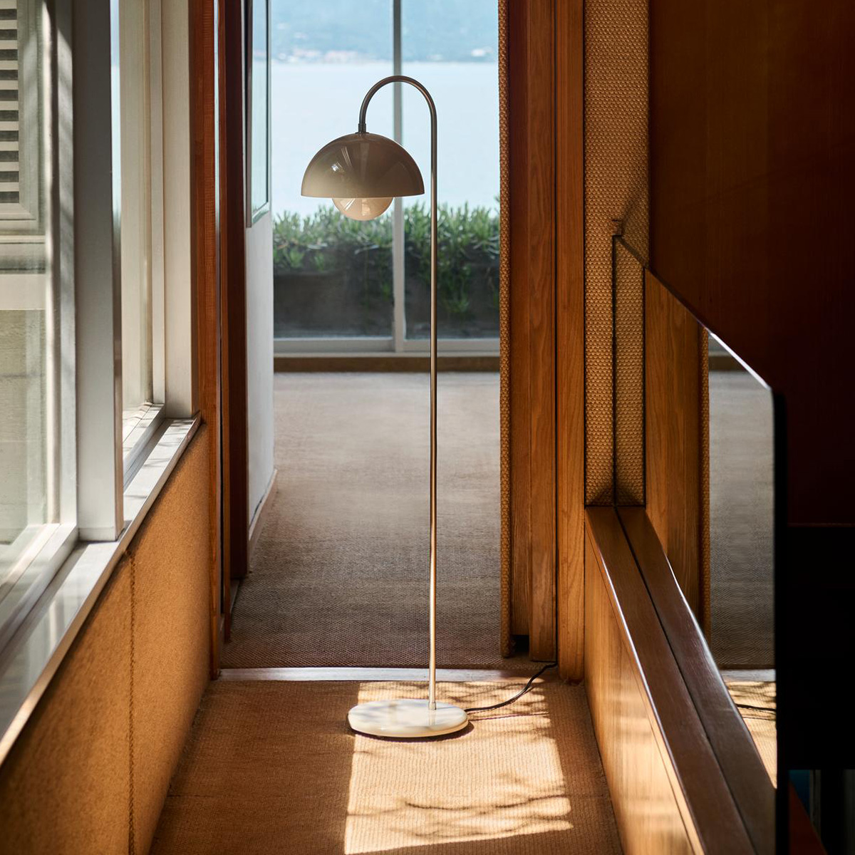 What makes the flowerpot floor lamp so popular? Discover the charm of this iconic lighting design.