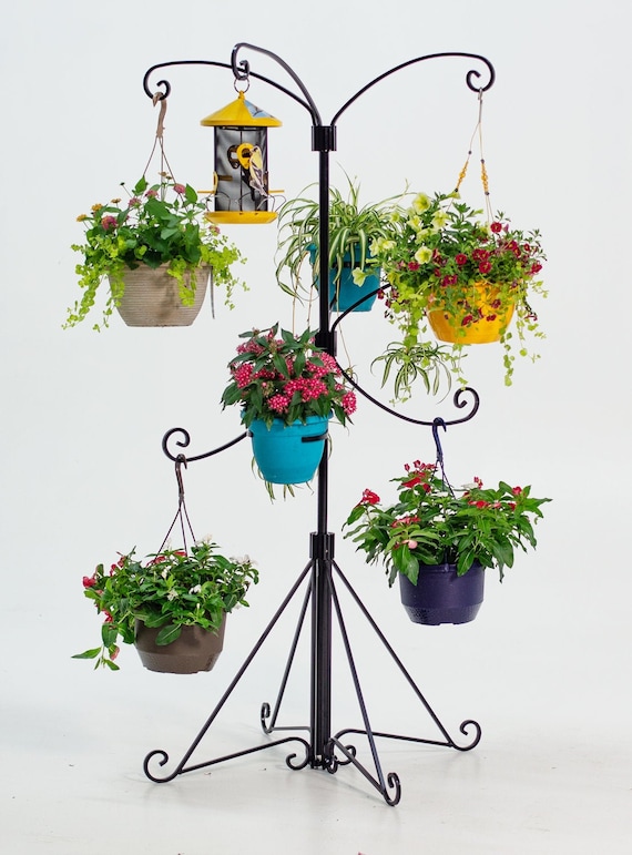 Got lots of plants? A plant stand tree can help! (See how it neatly organizes your green buddies)